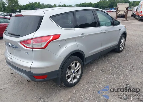 2013 Ford Escape Sel z USA, uszkodzony, nr VIN 1FMCU9H99DUB67900